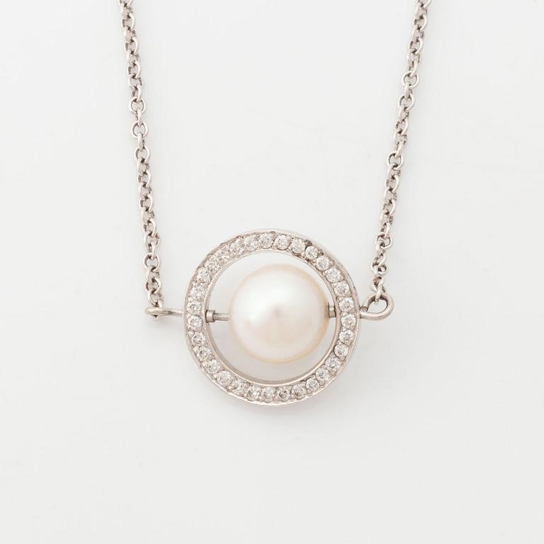 18K white gold, cultured pearl and brilliant cut diamond necklace.
