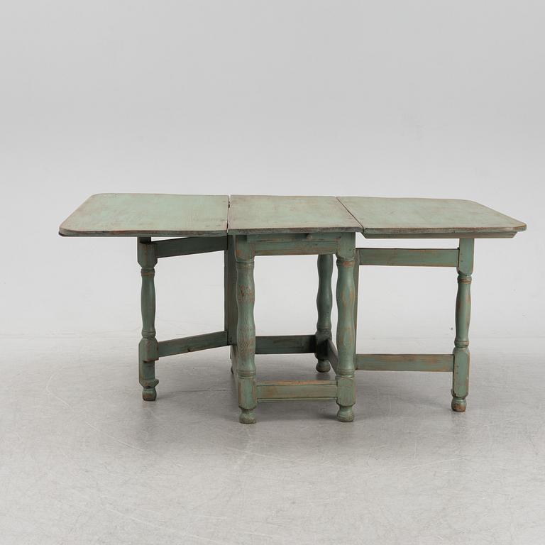 A painted pine gate-leg table, 19th Century.