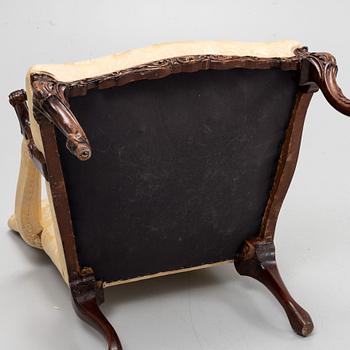 A carved mahogany George II armchair, 18th Century.