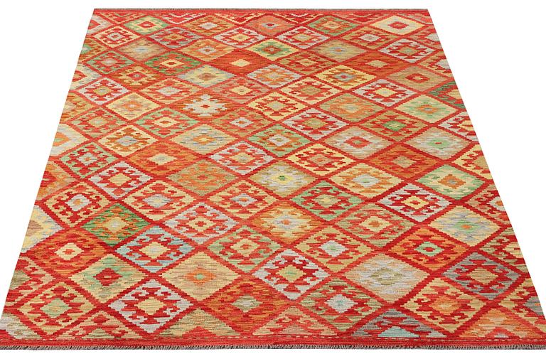 A Kilim carpet, c. 307 x 202 cm.