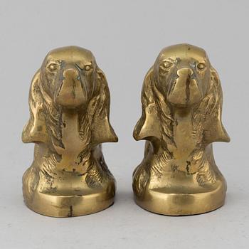 A PAIR OF BRASS BOOK ENDS; 20TH CENTURY.