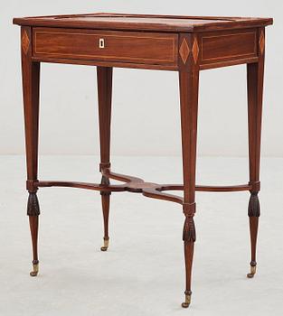 A late Gustavian early 19th century table attributed to L. Qvarnberg.