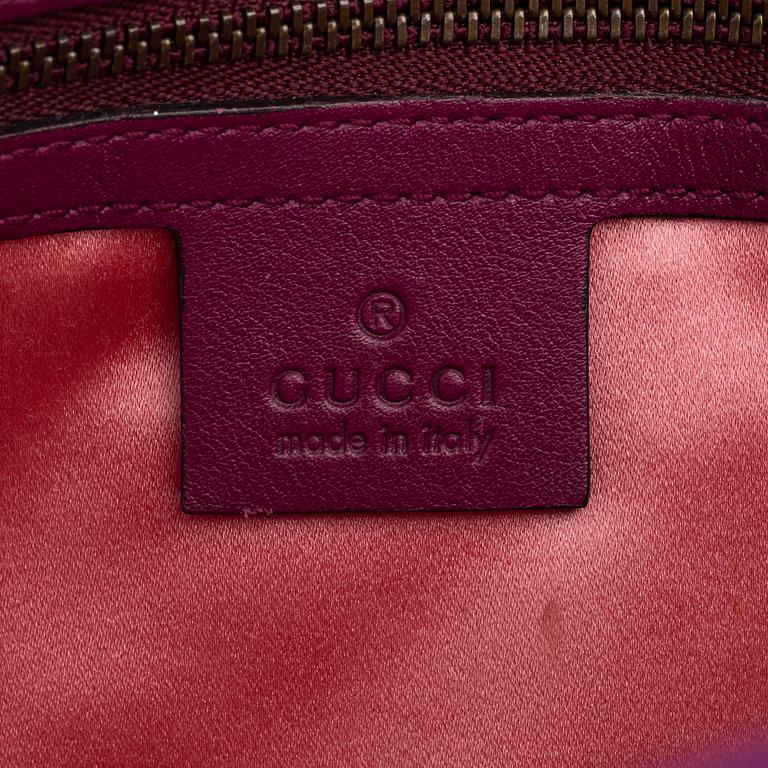 Gucci, a purple velvet 'Marmont' handbag, 2017.