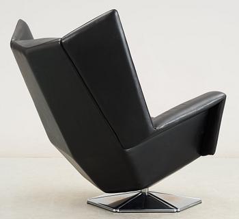 A Voitto Haapalainen black artificial leather and steel 'Prisma' easy chair, Tehokaluste Oy.