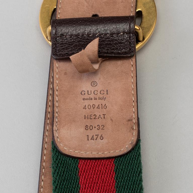 A canvas belt by Gucci.