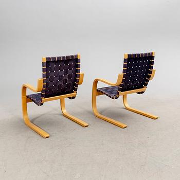 Alvar Aalto, a pair of birch armchairs model 406 21st century.