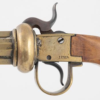 A brass percussion revolver by Johan Engholm (1820-1918).