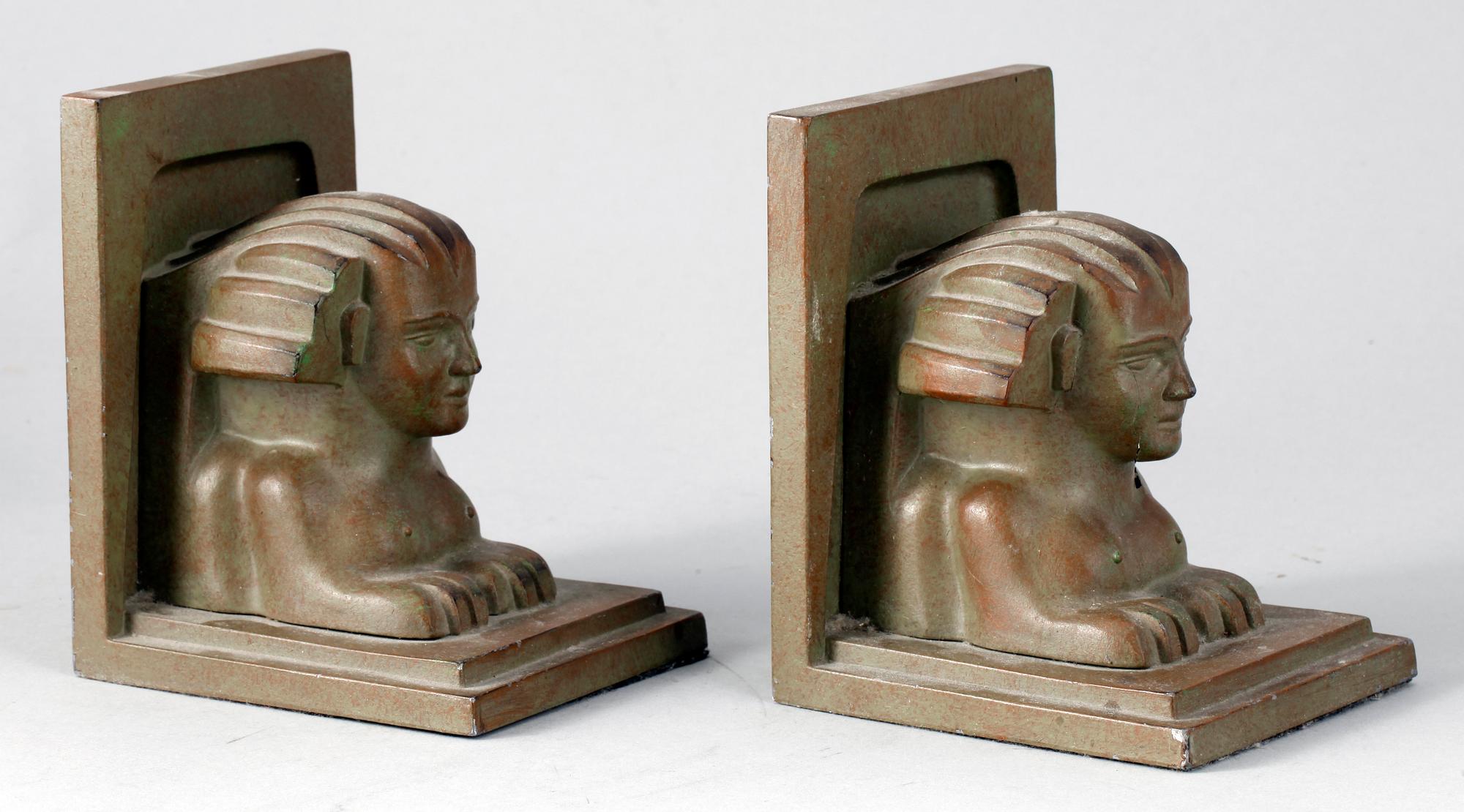 BOKSTÖD, ett par, metall. Art deco, 1900-tal.