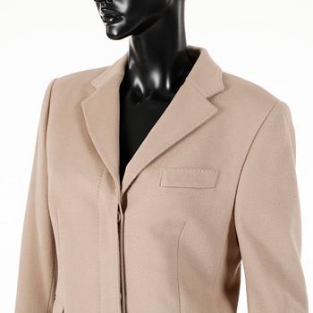 GUCCI, a beige wool and cashmere coat.