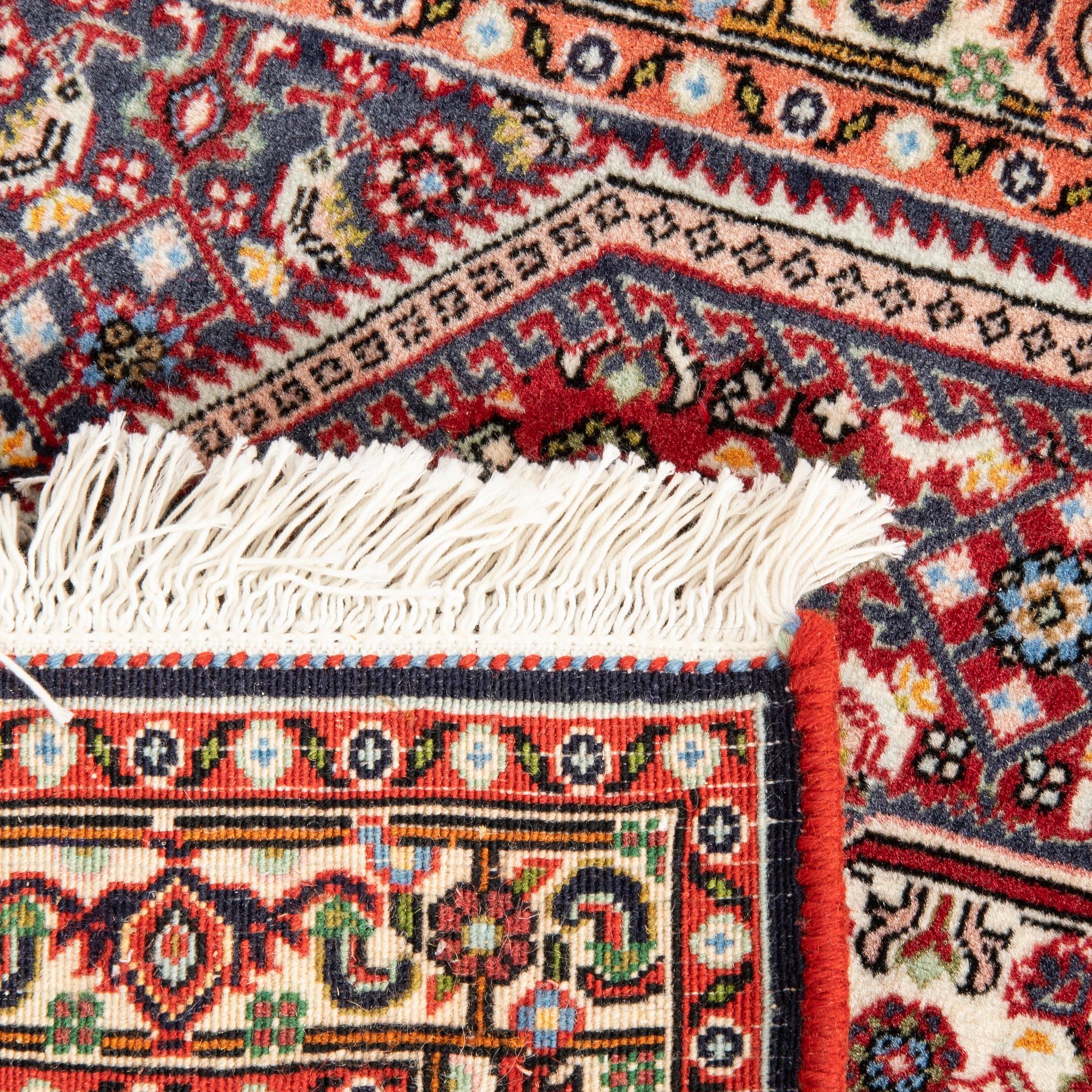 An old Bidjar carpet approx 100x71 cm.