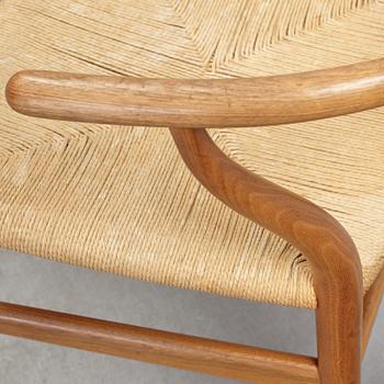 A set of four + two armchairs 'Y-chair' by Hans J Wegner, Carl Hansen & Son, Denmark.