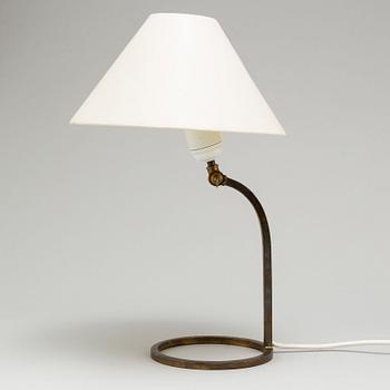 A brass wall/table lamp, mid 20th century.