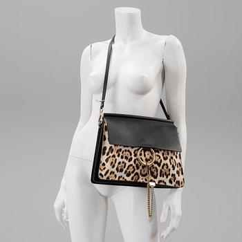 A Chloé "Faye" handbag with imitation leopard.