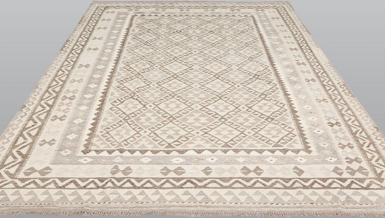 A Kilim carpet, c. 300 x 205 cm.