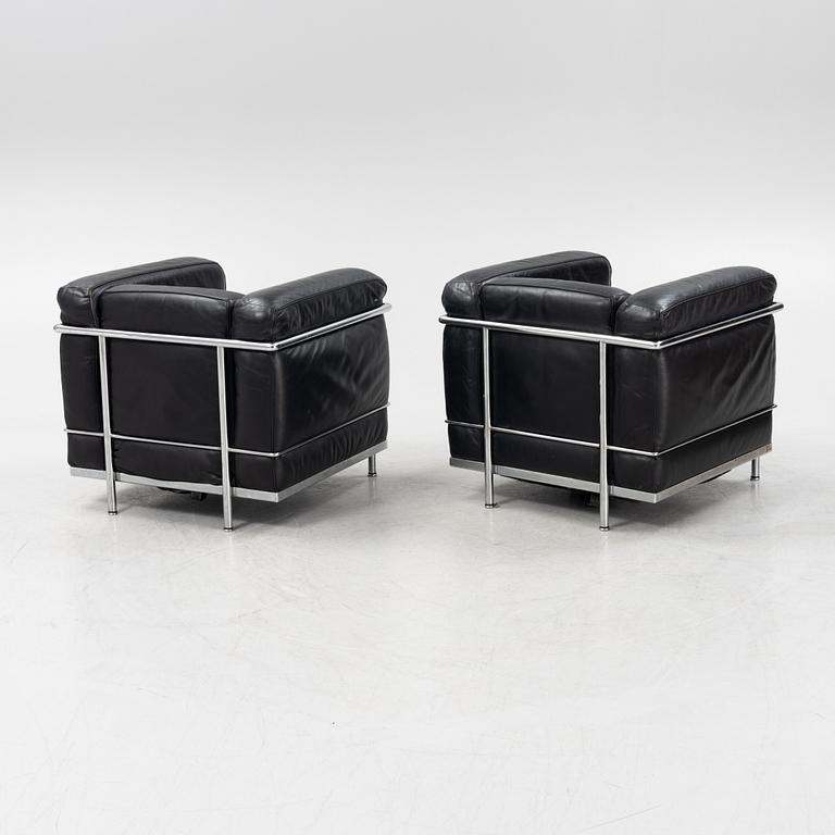 Le Corbusier, Pierre Jeanneret & Charlotte Perriand, a pair of 'LC2' easy chairs, Cassina.