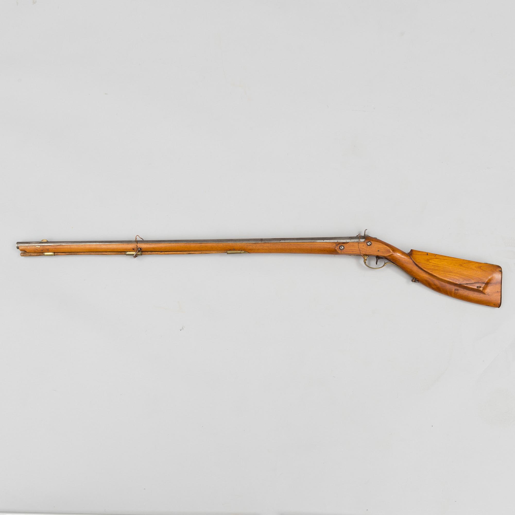 An 18th century percussion gun.