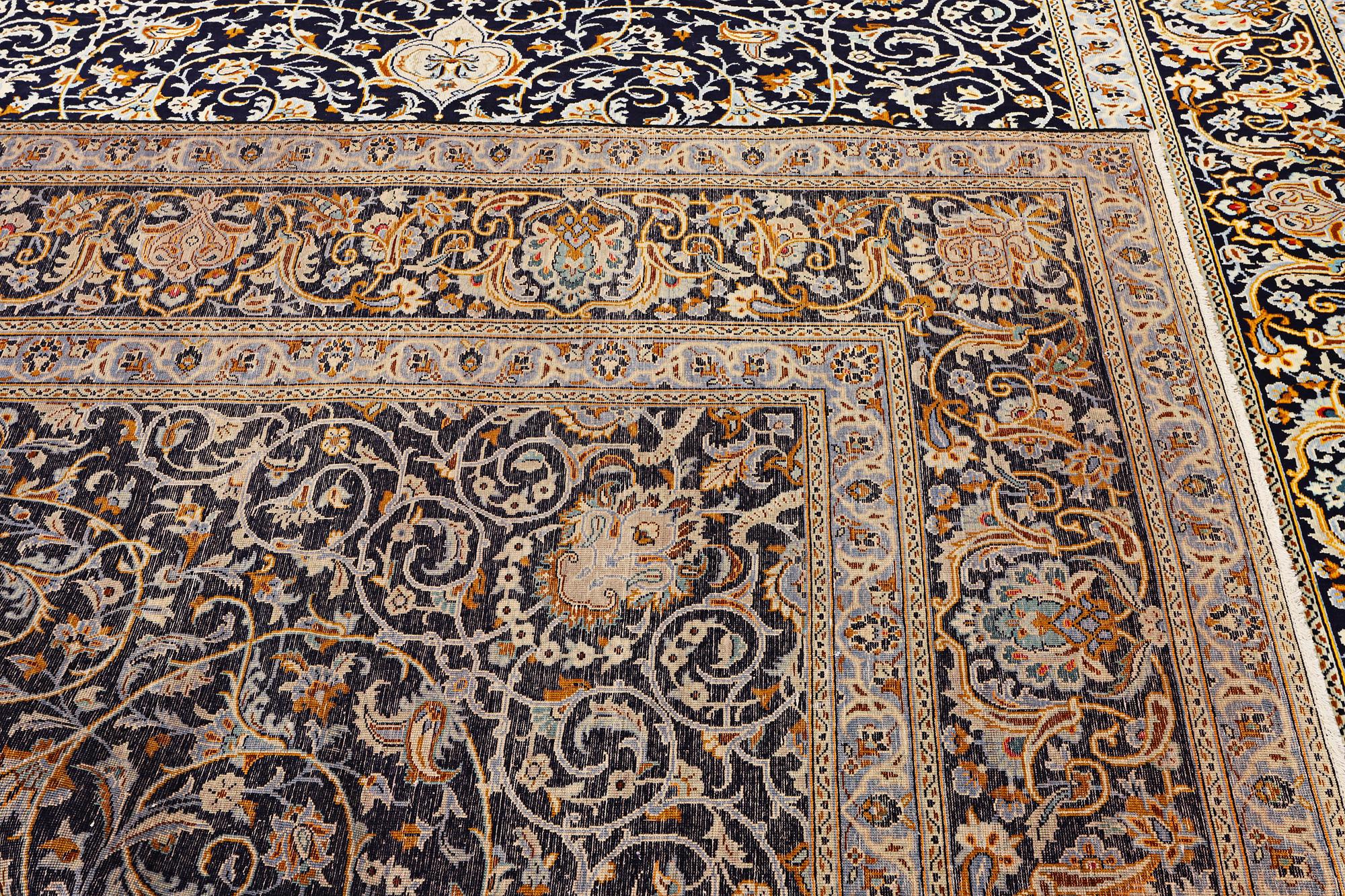 A Kashan carpet, c. 383 x 310 cm.