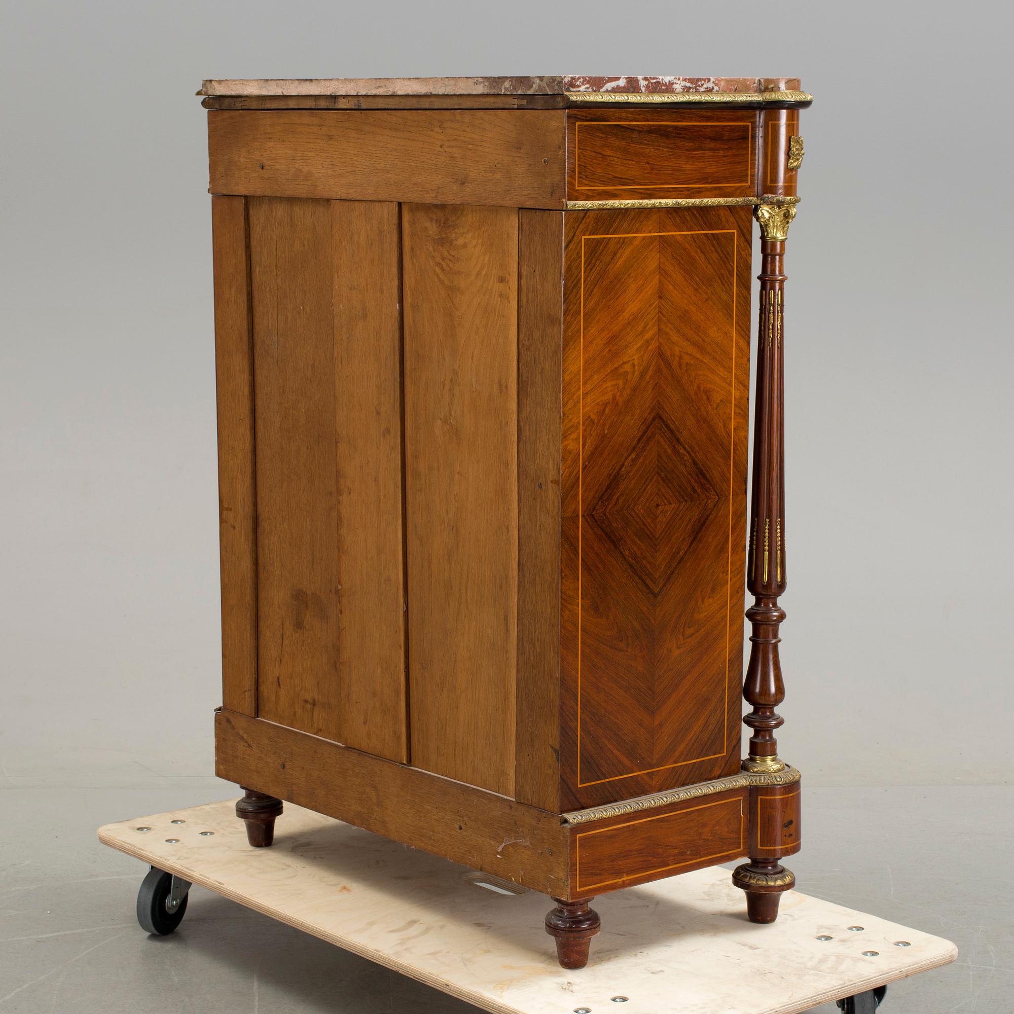 An early 20th century Louis XVI style cabinet.