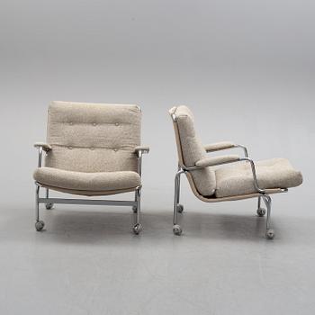 A pair of 'Karin' easy chairs by Bruno Mathsson for Dux, second half of the 20th century.