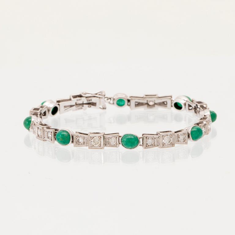 An 18K white gold bracelet set with emeralds and round brilliant-cut diamonds, Bertil Lundberg Goldsmith Stockholm 1961.