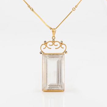 Pendant with chain, 18k gold and rock crystal, Stigbert.