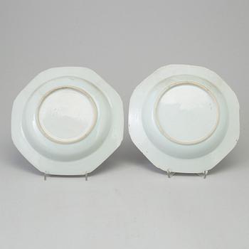 Two blue and white dishes and two cups with dishes, Qing dynasty, Qianlong (1736-95) and Kangxi (1662-1722).