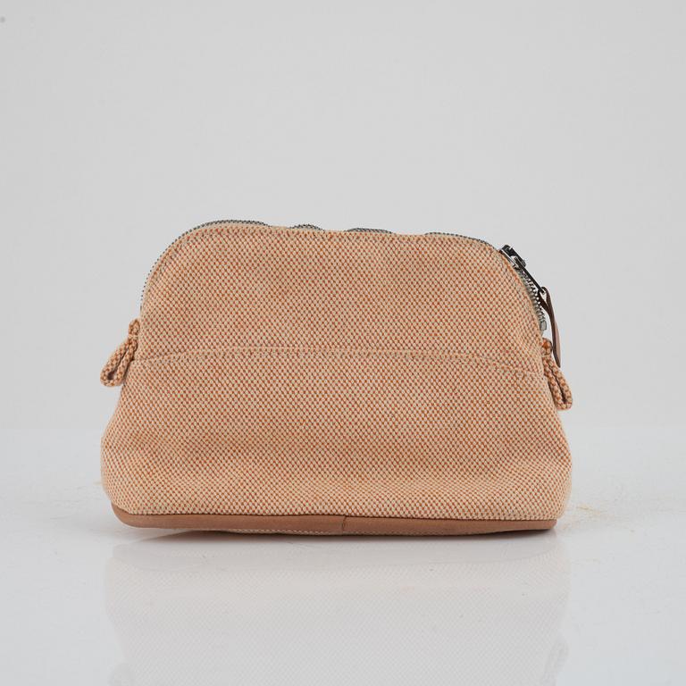 Hermès, "Fourre tout PM" bag and toiletry bag.