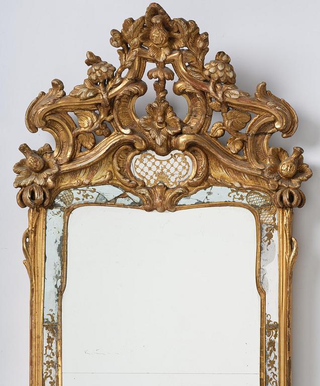 A rococo giltwood mirror, Stockholm, later part 18th century.