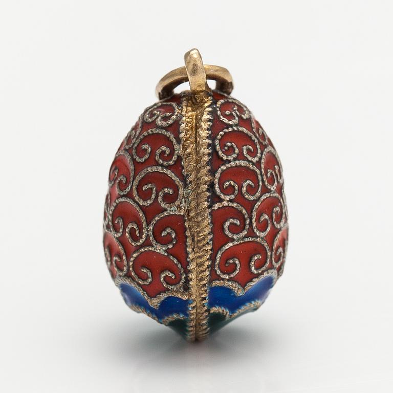 An egg pendant made of sterling silver and enamel. Import marked Kultakeskus, Helsinki.