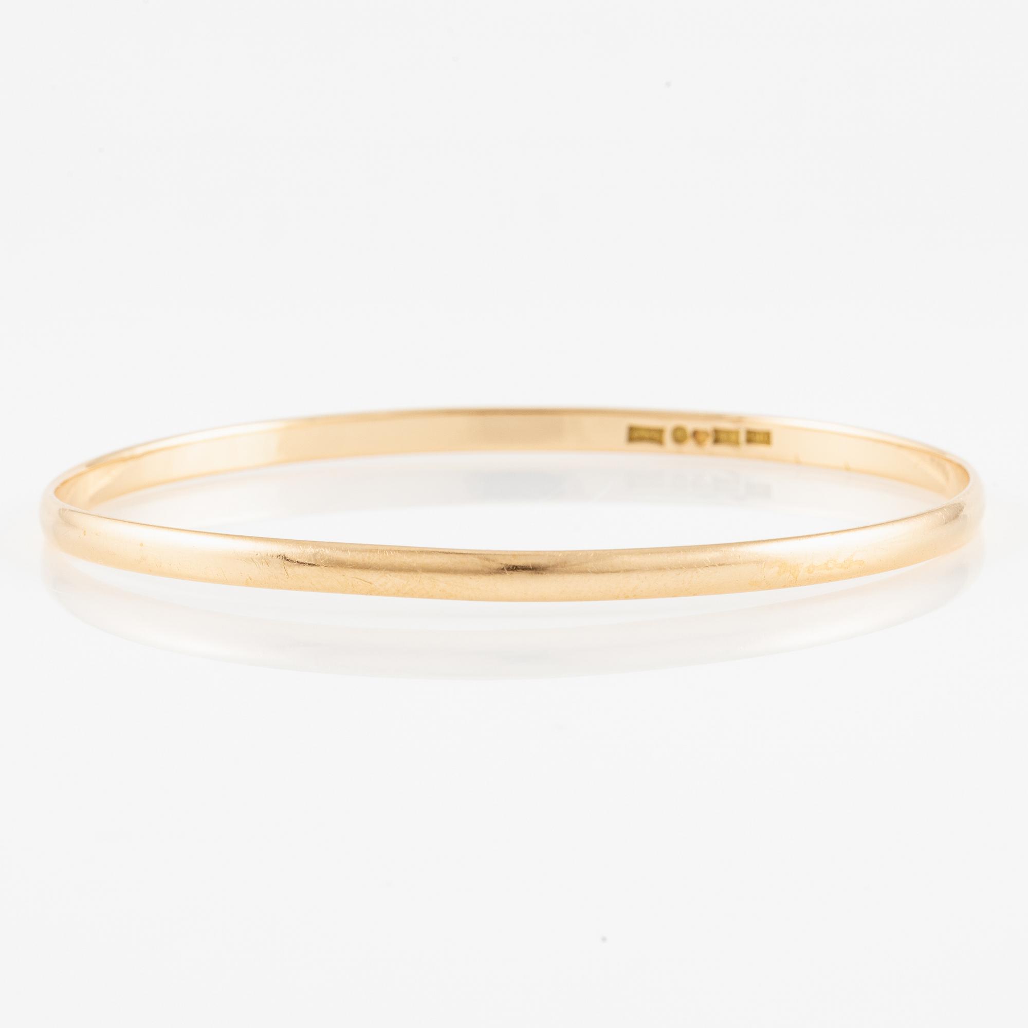 Arm ring 18K gold.