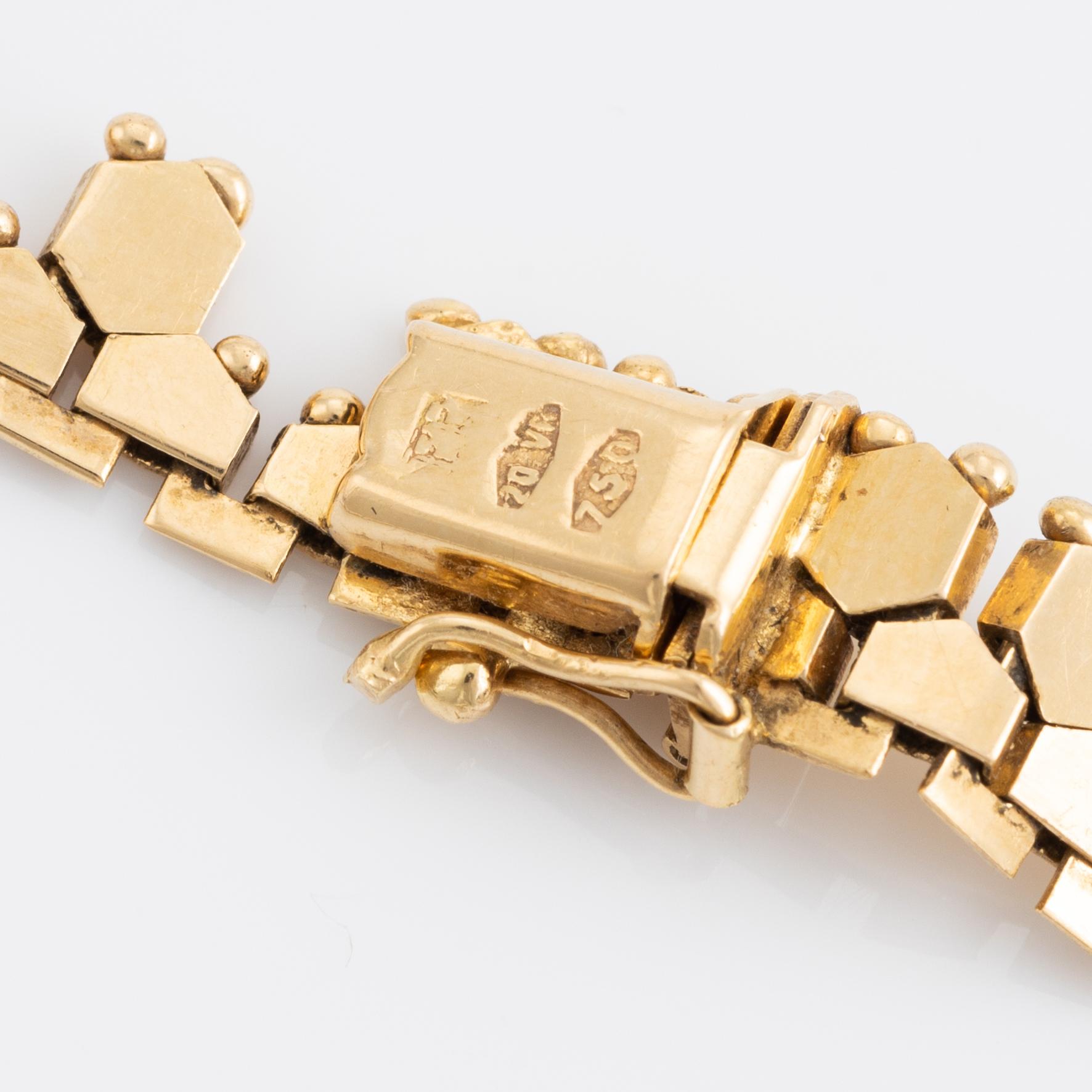 Halscollier, 18K guld, med tandmönster.