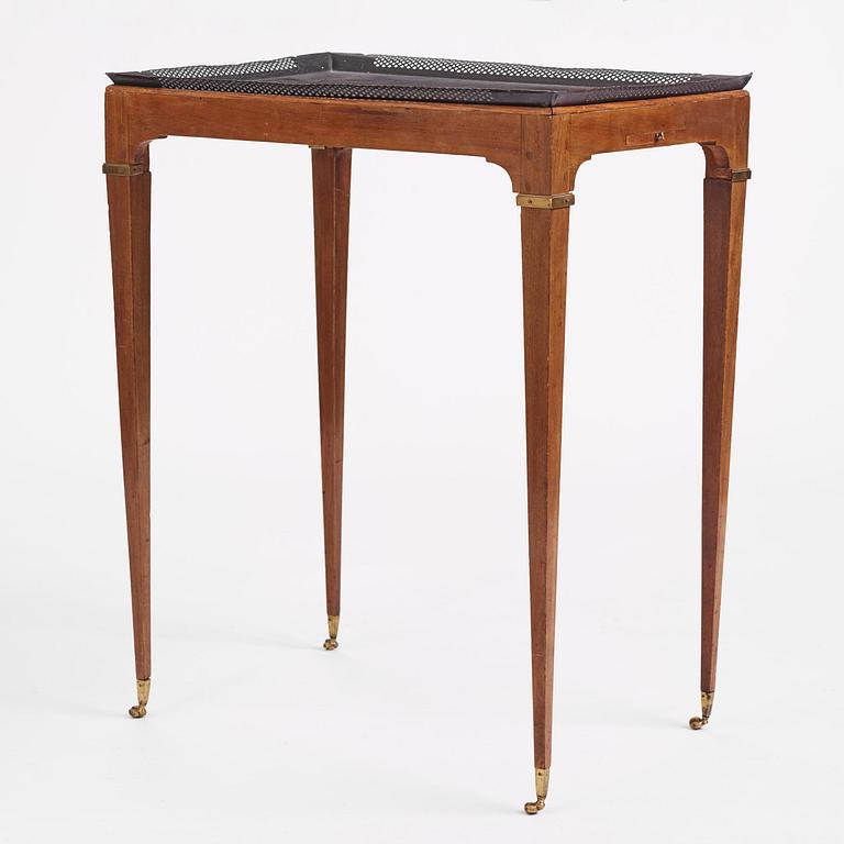 A late Gustavian tôle-peinte and mahogany tray-table from the workshop of Georg Haupt, Stockholm, late 18th century.