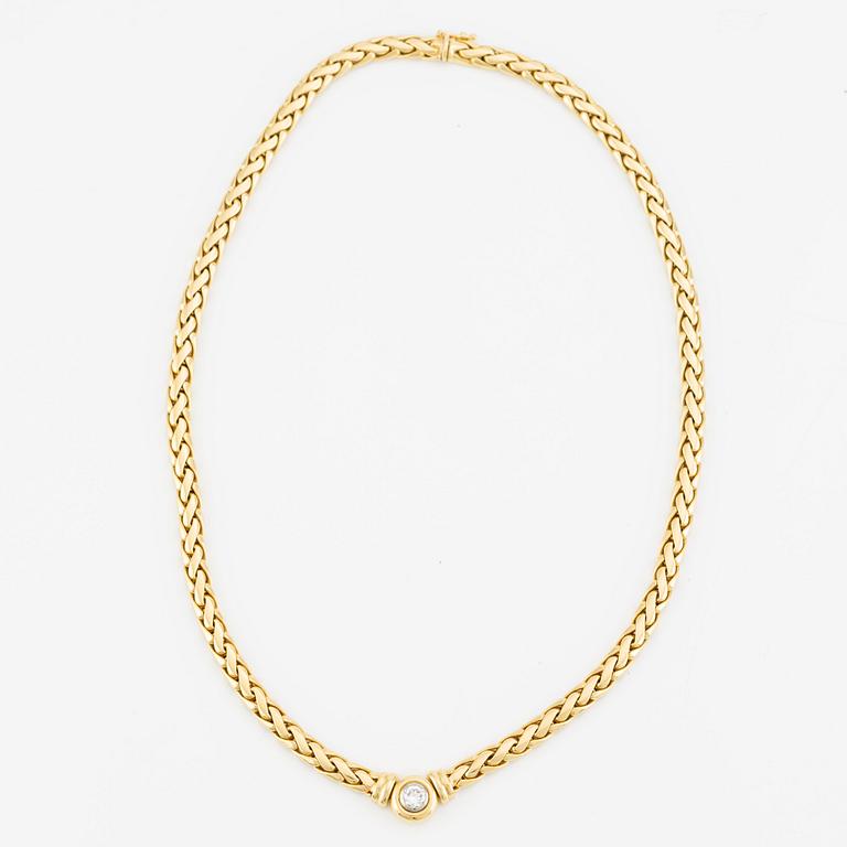 Collier/armband med en rund briljantslipad diamant ca 0.35 ct.