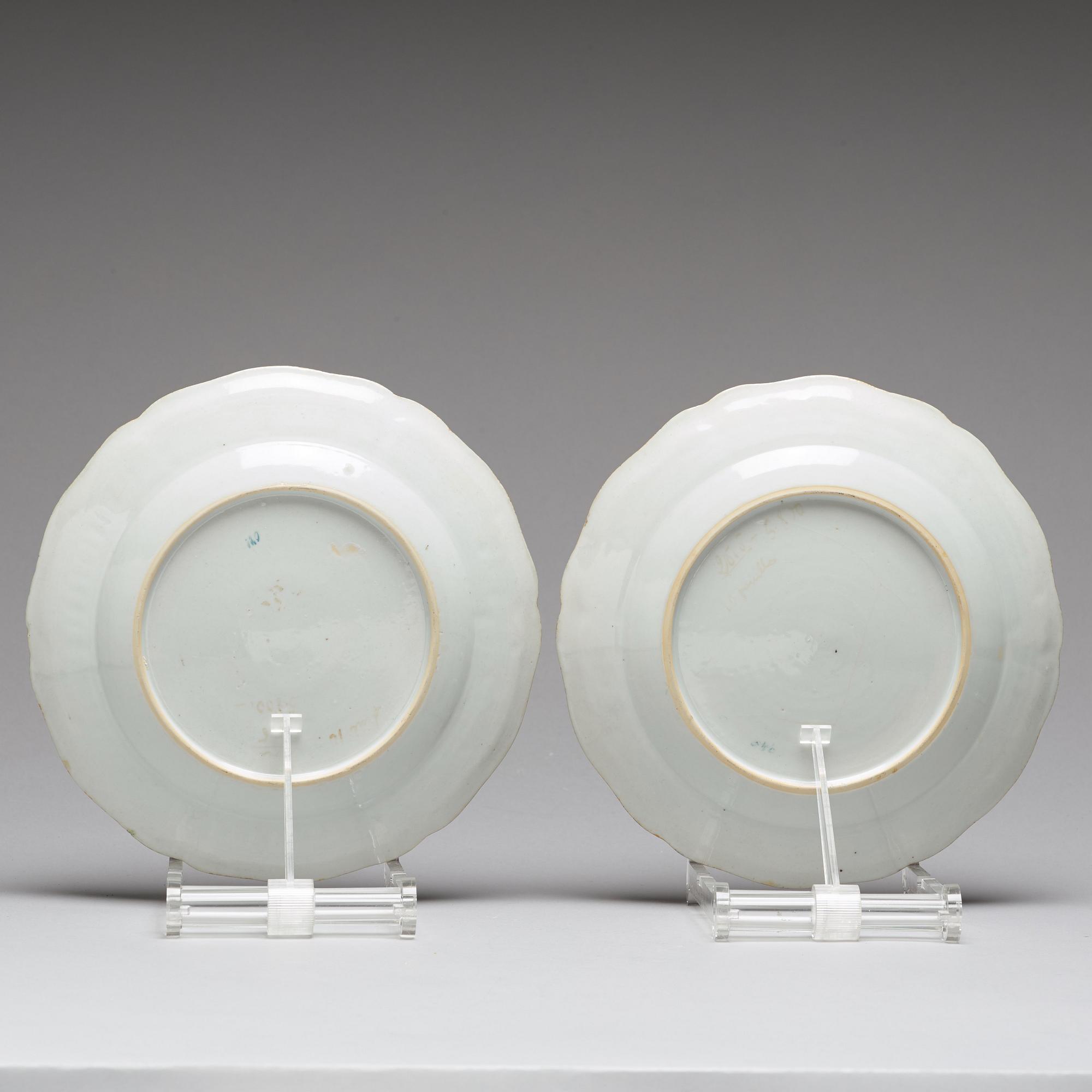A set of two famille rose armorial dinner plates, Qing dynasty, Qianlong (1736-95).