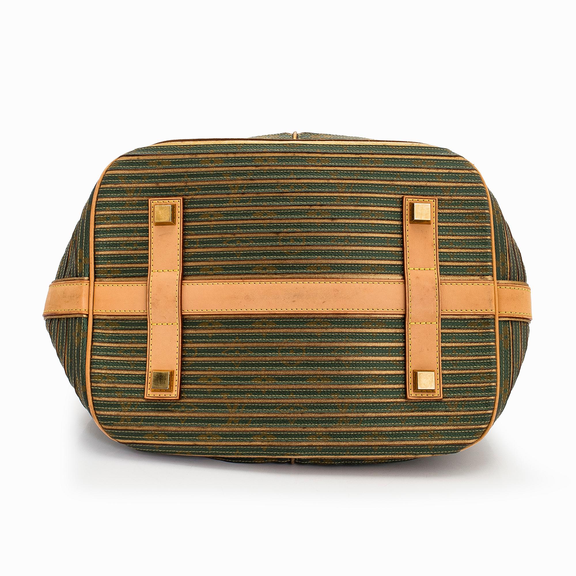 Louis Vuitton, an "Eden Neo" bag.
