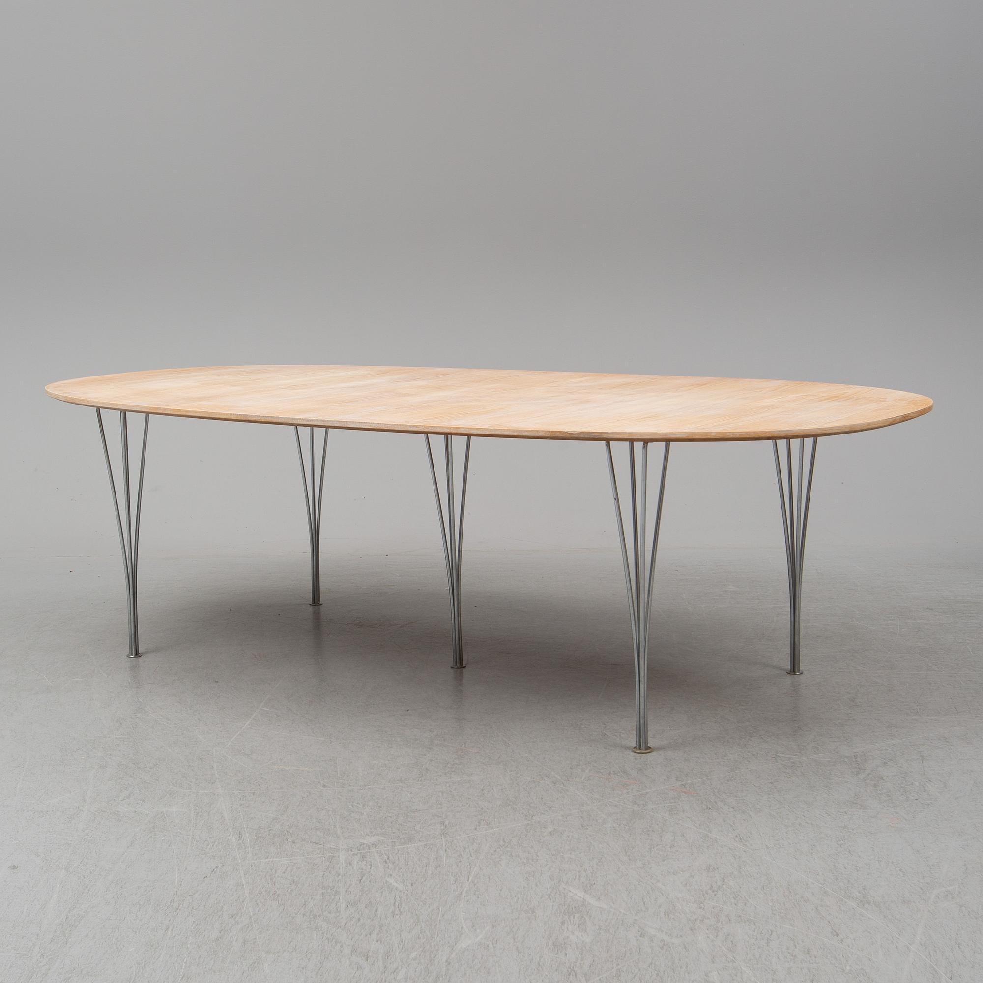 BRUNO MATHSSON & PIET HEIN, a 'Superellips' dining table, Fritz Hansen, Denmark, 1994.