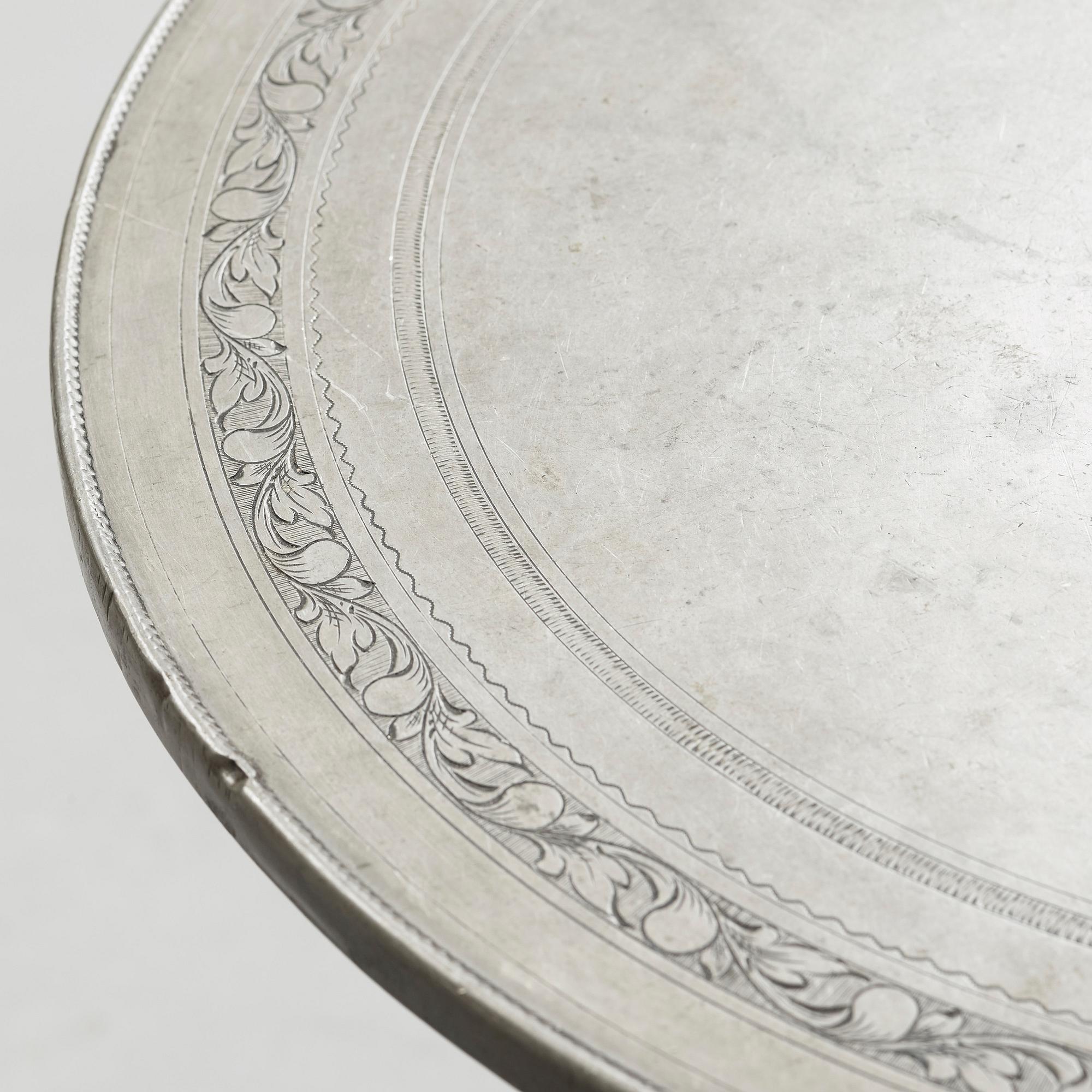 A Carl Malmsten Swedish Grace pewter top table, executed by Nordiska Kompaniet for Grand Hotel Stockholm ca 1925.