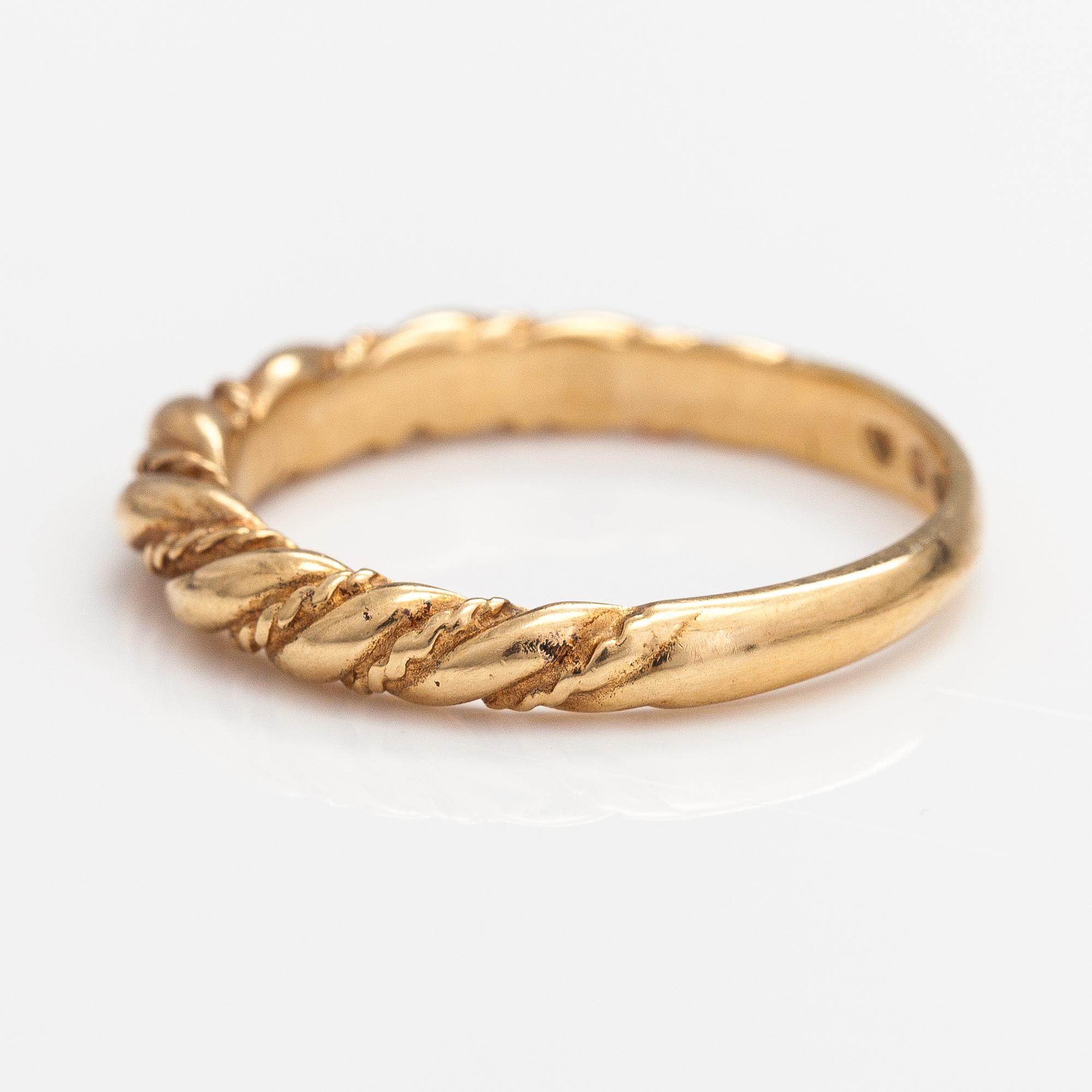 An 18K gold ring "Twined jewellery from Lampola in Halikko". Kalevala koru, Helsinki 1978.