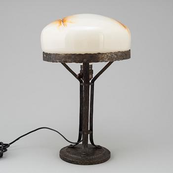 A wrought iron table light, early 20th Century.