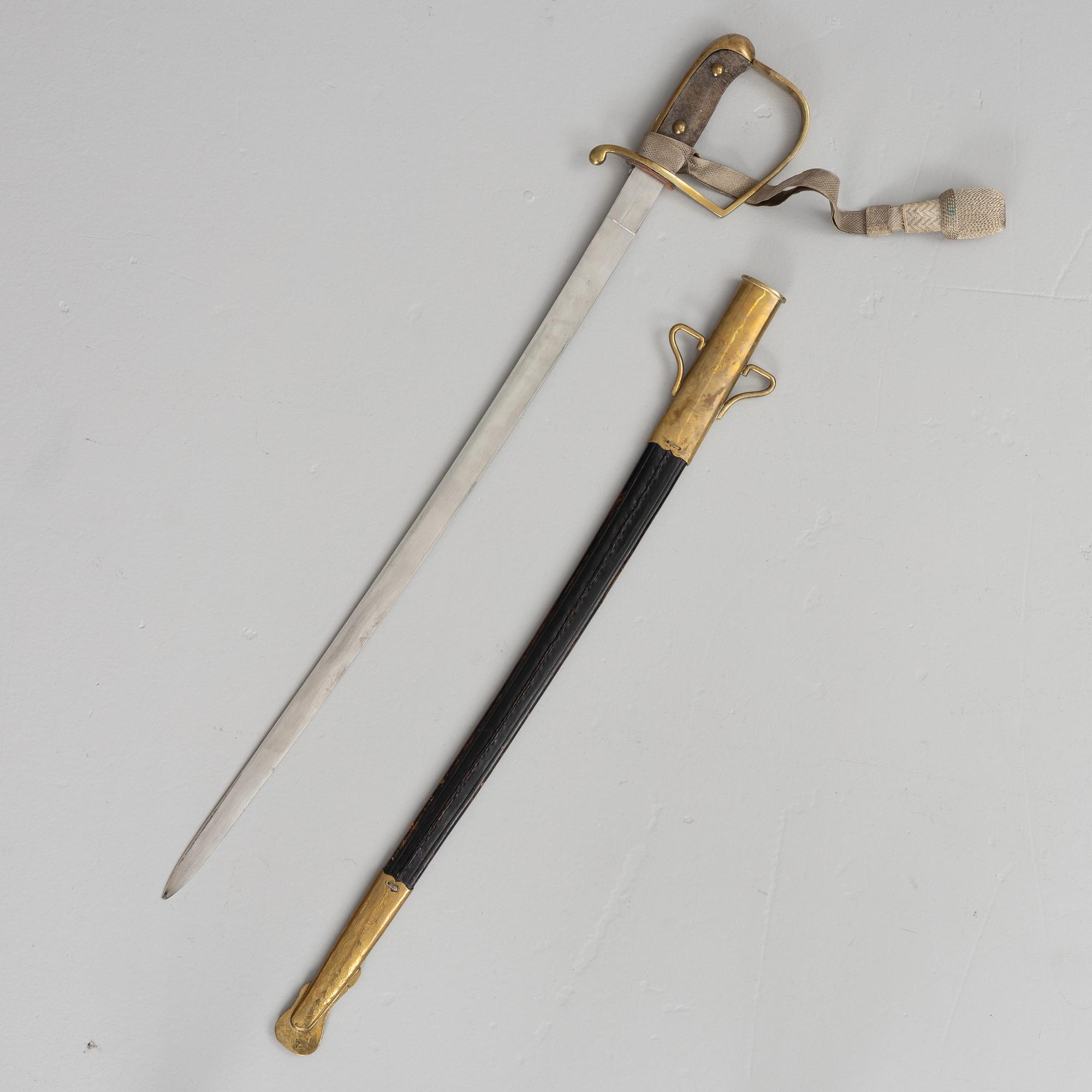 Polissabel, 1900-talets början, med balja.
