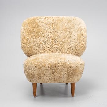 Sven Staaf, a model '1765' sheepskin upholstered easy chair, Swedish Modern, 1940's.
