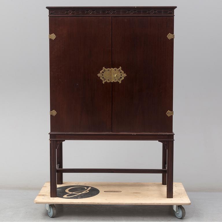 A mid 20th Century mahognay drink cabinet.