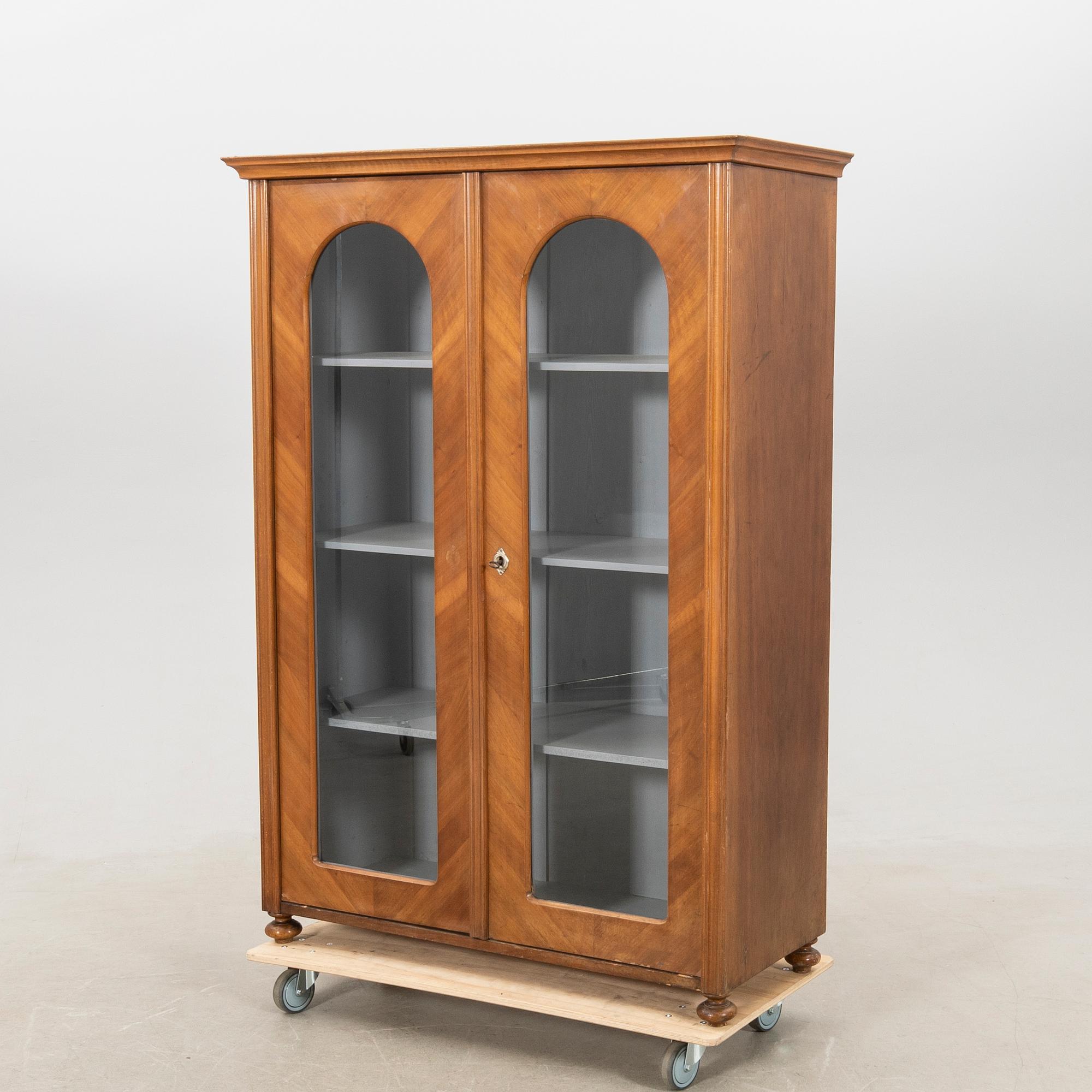 Display cabinet circa 1900.