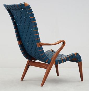 An Axel Larsson mahogany and leather armchair, Bodafors, 1940's.