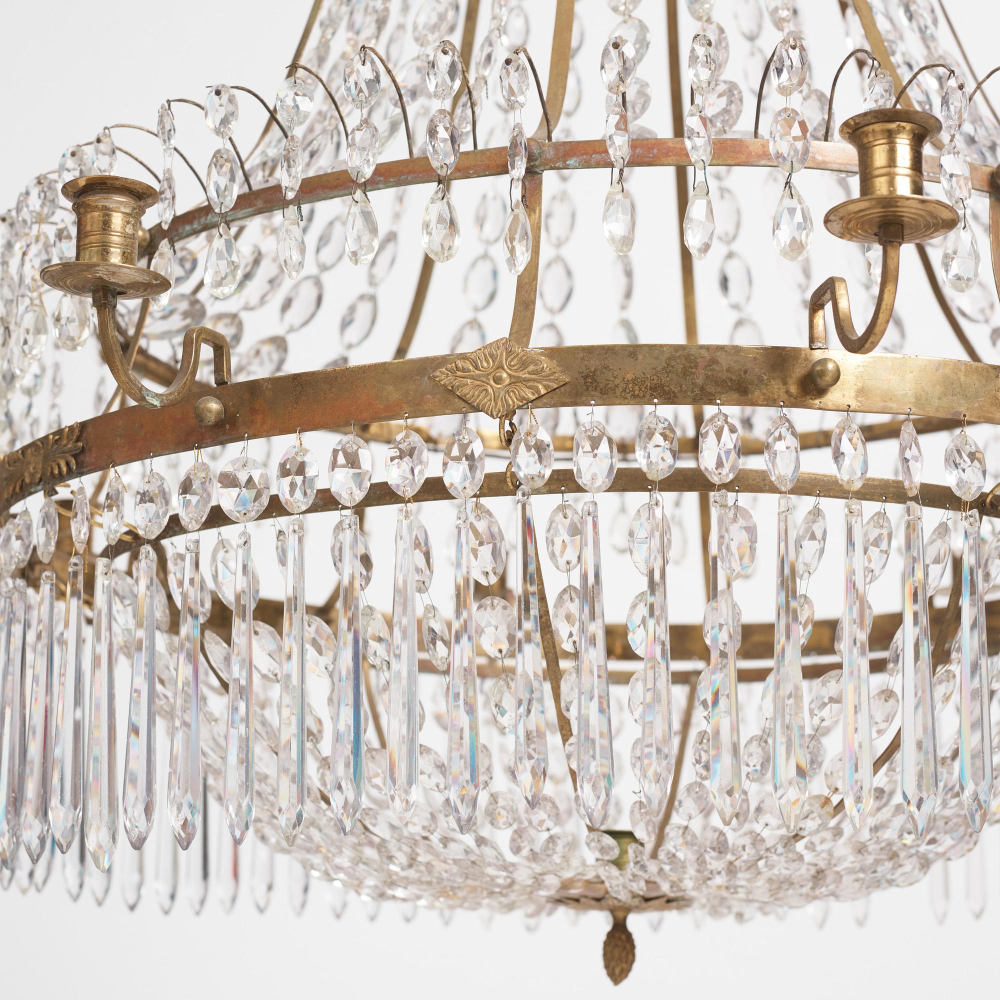 A late Gustavian nine-light gilt brass and cut glass chandelier, Stockholm, late 18th century.