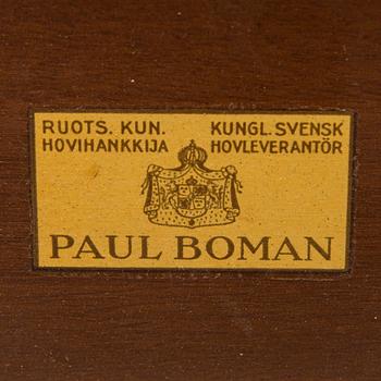 A mid 20th century conference table / dinner table marked Paul Boman.