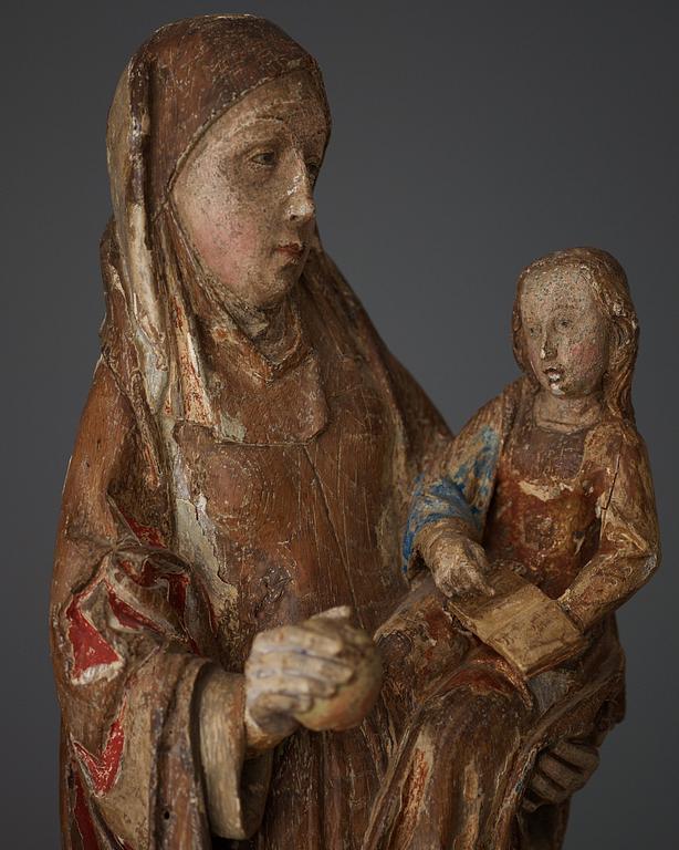 A late Gothic wooden sculpture of Anna selbdritt, presumably 16th century.