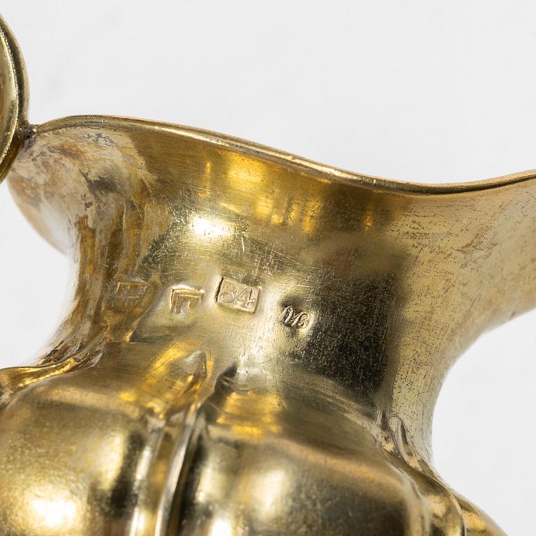 A Russian silver-gilt cream jug, Minsk, 1860s.