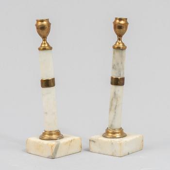 A pair of Gustavian style candelsticks, 13th/20th century.