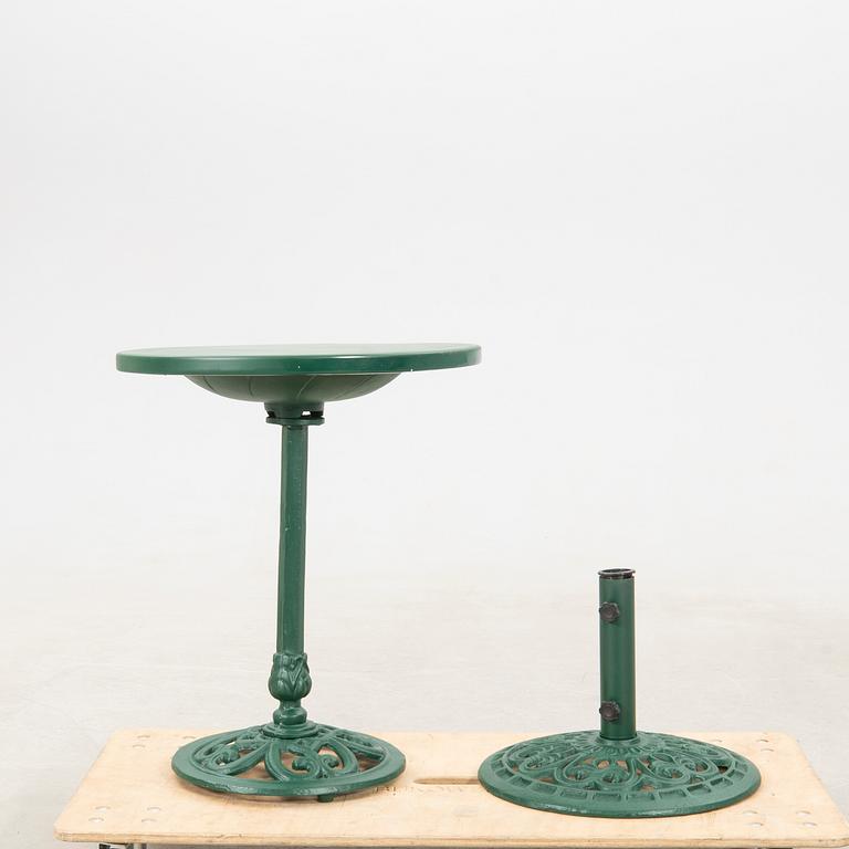 Bird bath and parasol base, second half of the 20th century, cast iron.